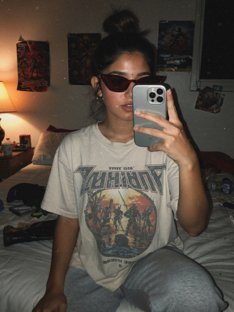 GXD DXMN Crimson Cat-Eye in a low-light bedroom mirror selfie